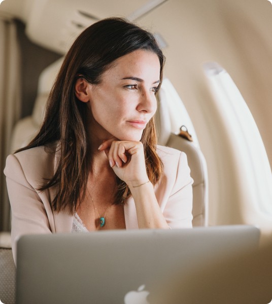 Passenger on the phone onboard a Pilatus aircraft