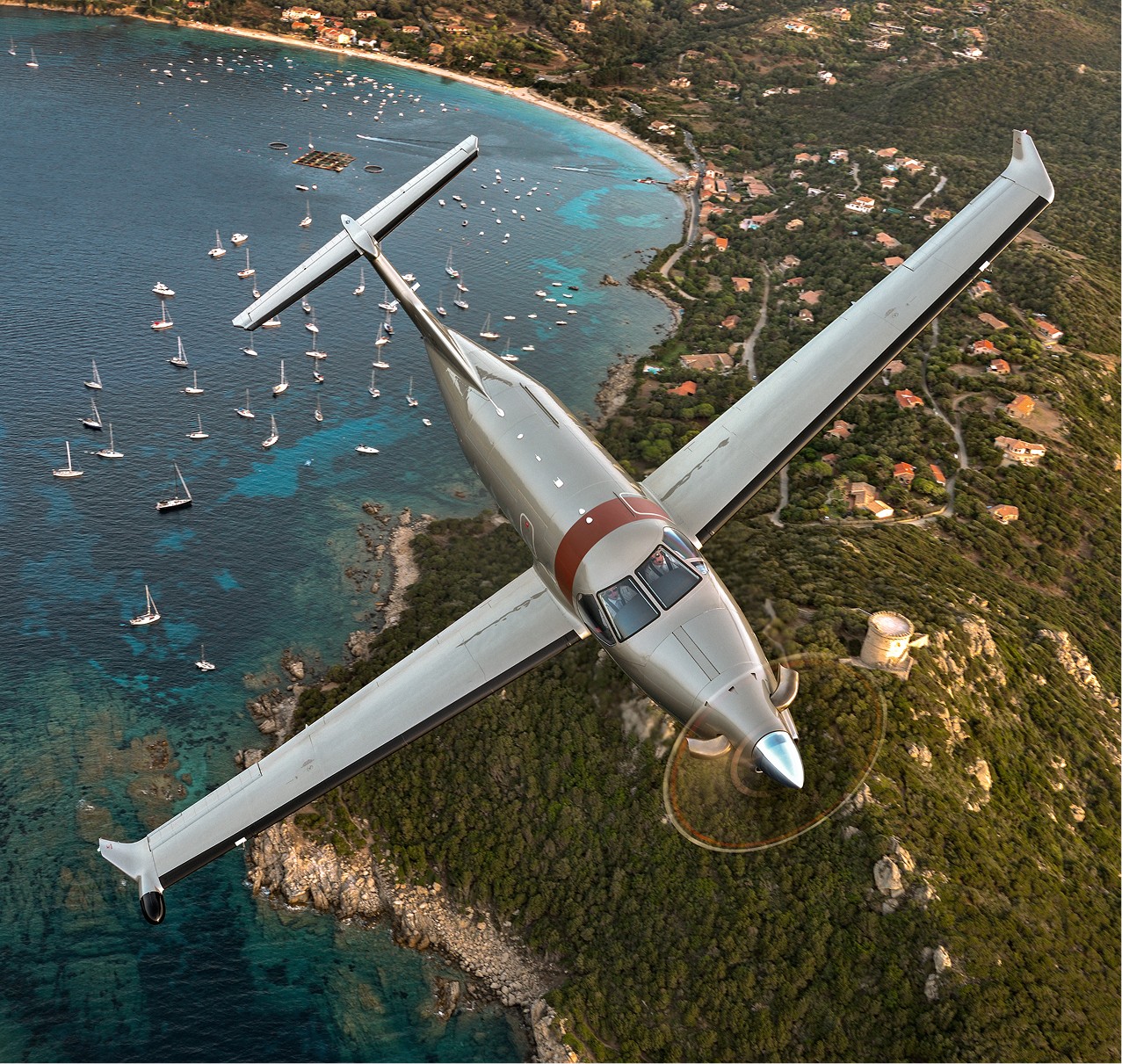 Pilatus PC-12 flying over Corsica