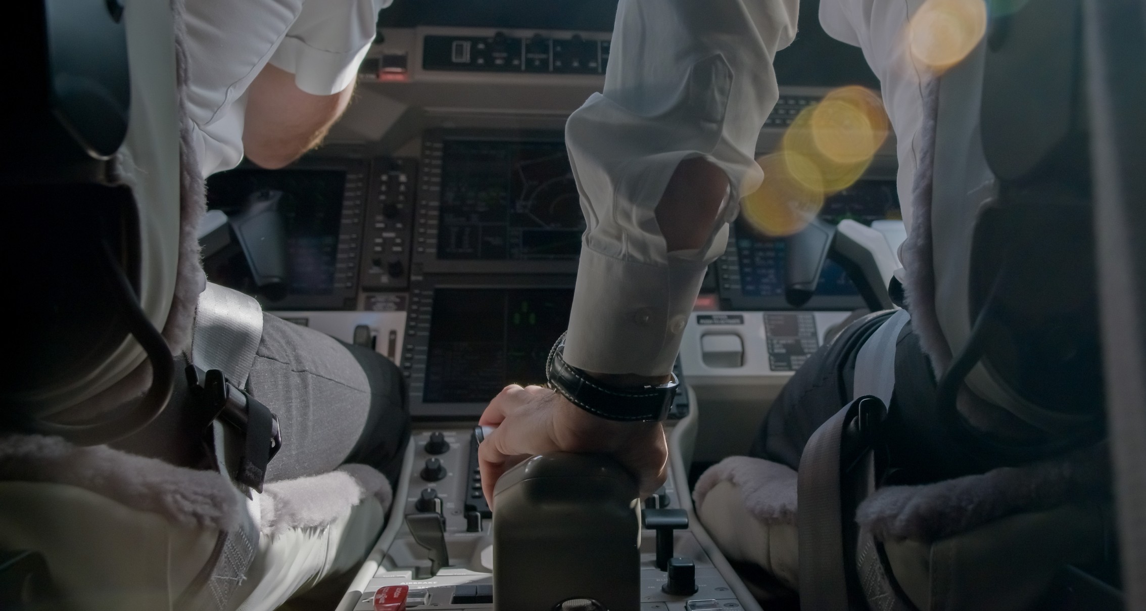 Closeup of pilots flying a Pilatus aircraft