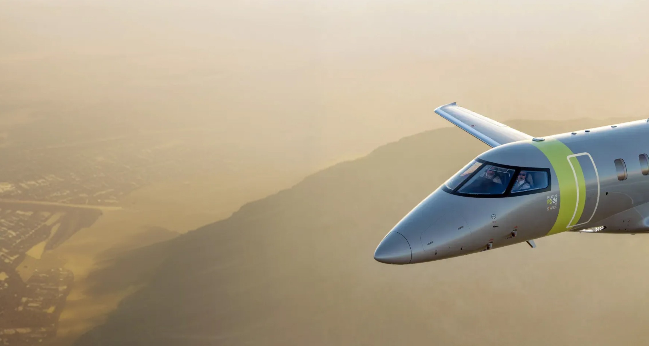 Closeup of pilots flying the Pilatus PC-24