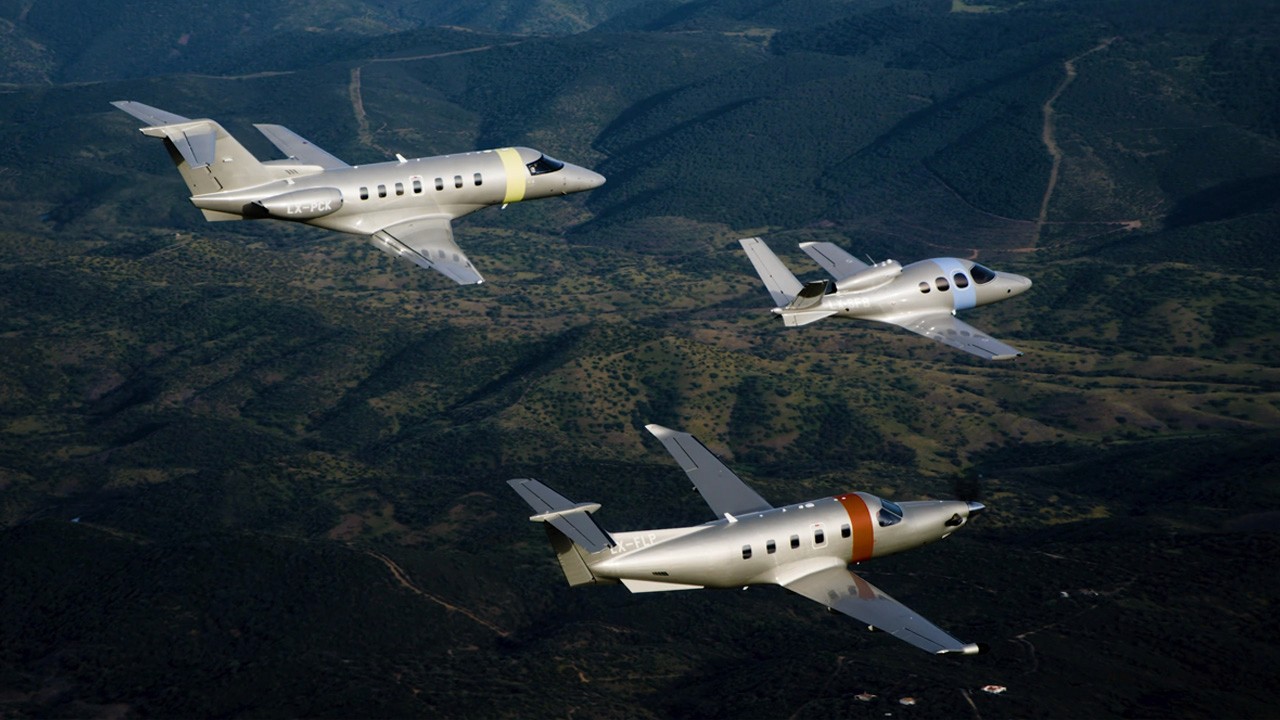 Jetfly Pilatus PC-12, PC-24 and Cirrus Jet flying over mountains