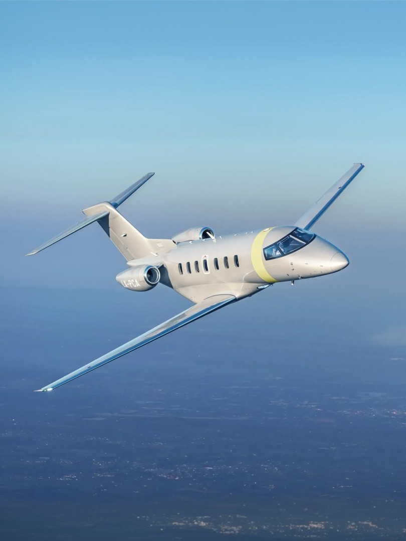 Pilatus PC-24 flying in blue skies