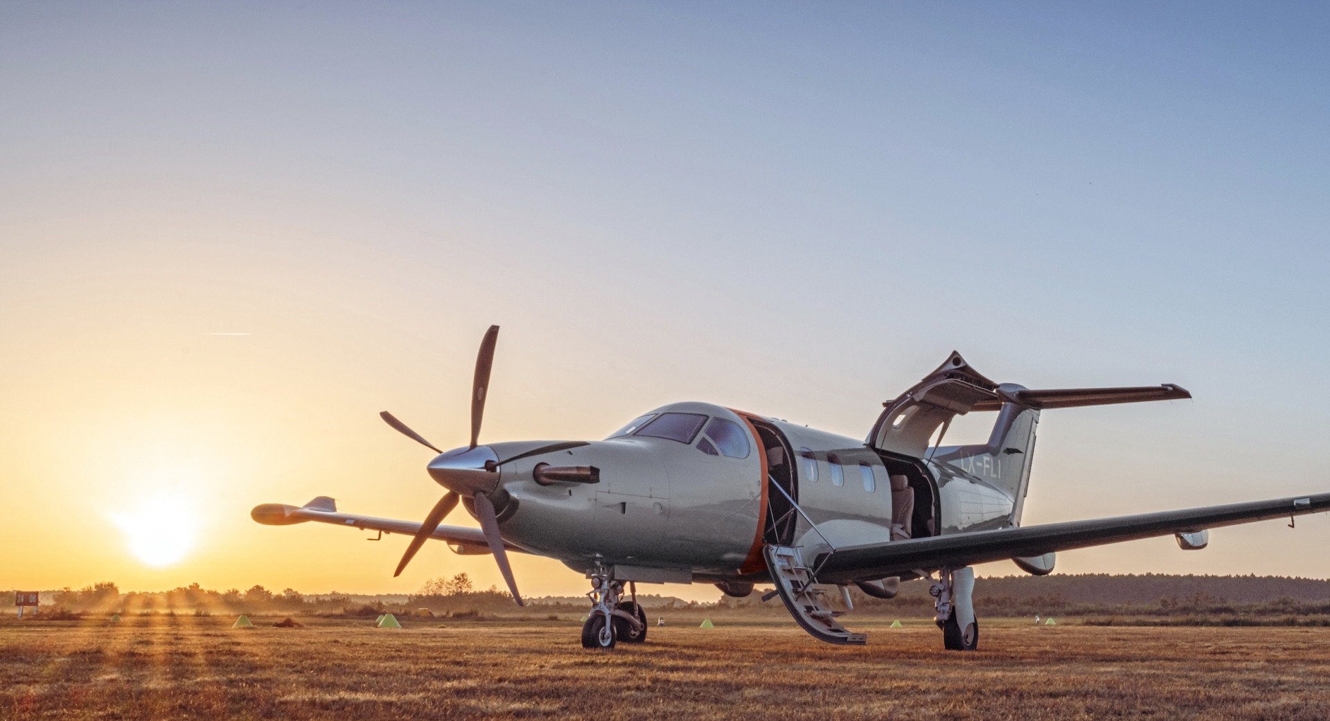 Pilatus PC-12 on grass